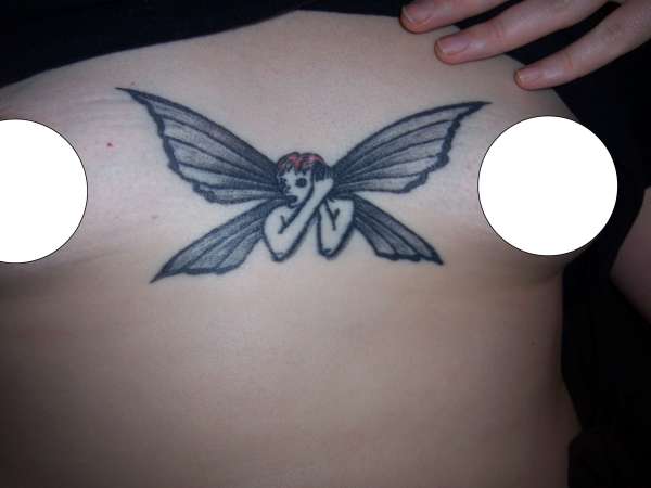 Fairy between my breasts tattoo
