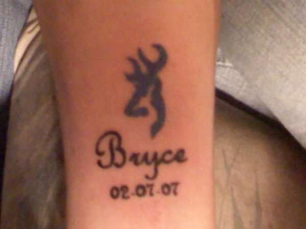 Name and DOB tattoo