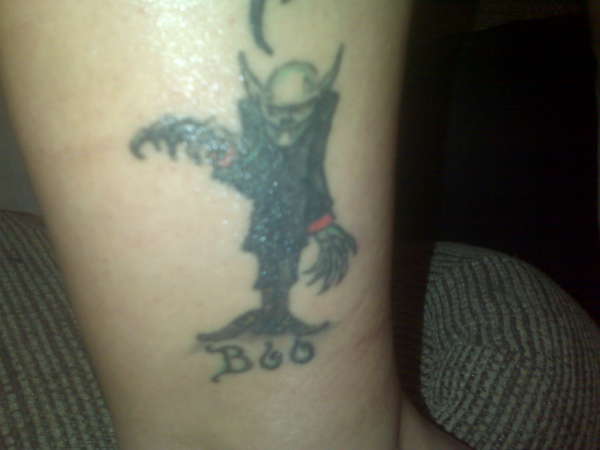 ugly man tattoo