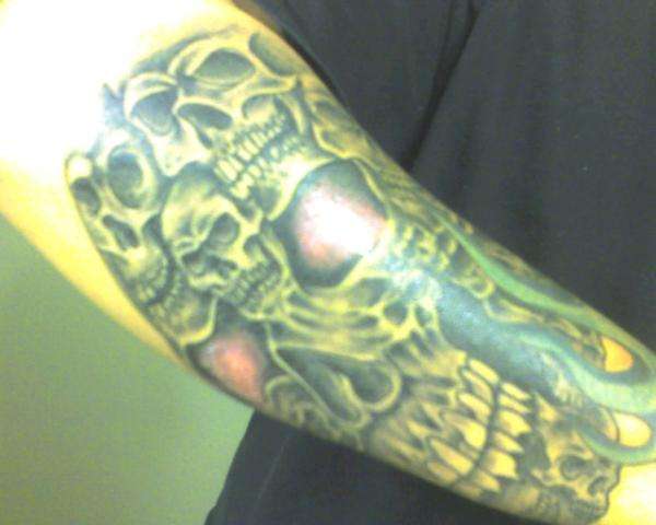 Skulls in a skull tattoo