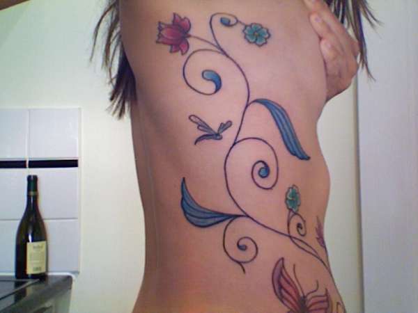 (top part) floral rib design tattoo