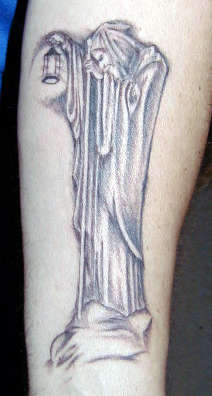 Led Zeppelin sigils or runes tattoo