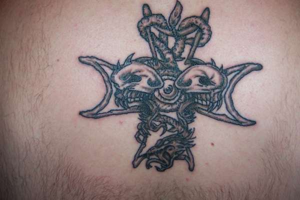 Evil Cross on my back tattoo