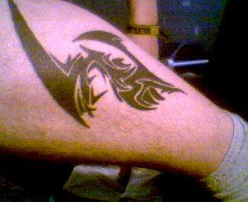 left leg tattoo