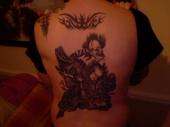 my back dark pick tattoo