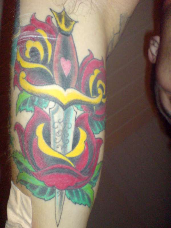 Dagger and roses tattoo