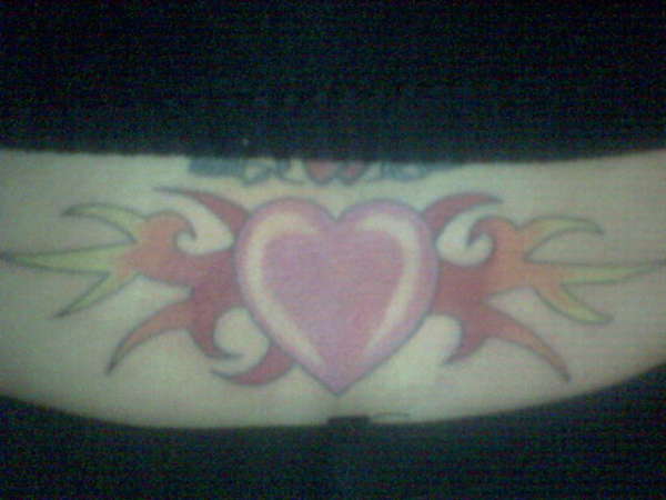 HEART LOGO WITH TRIBAL tattoo