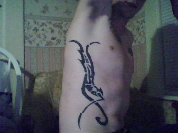 Right rib tribal tattoo tattoo