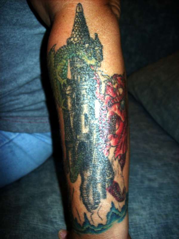 Dragons on castle tattoo