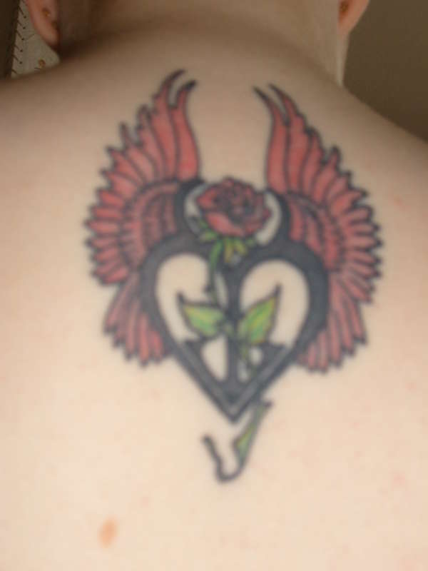 rose with wings tattoo