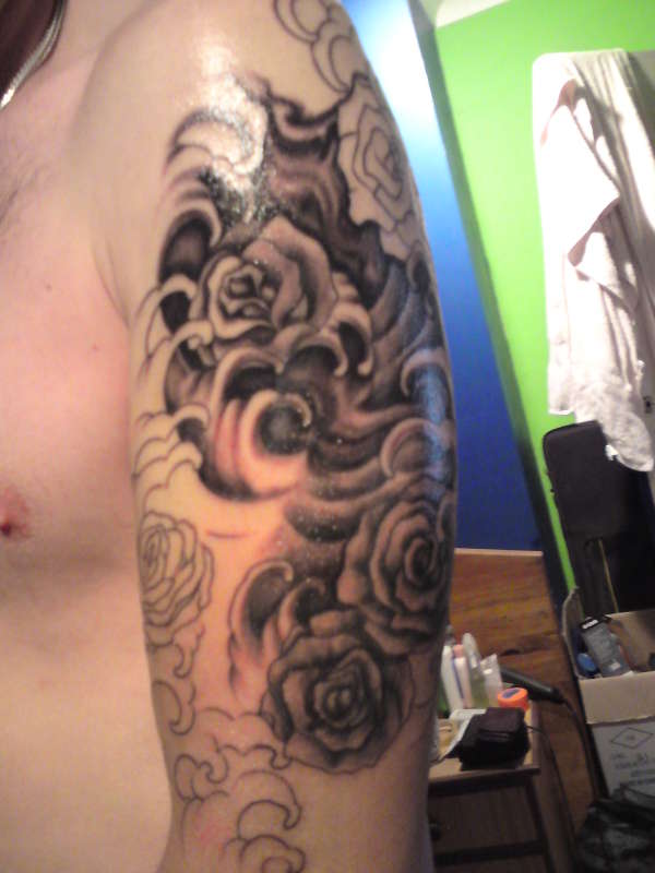 roses waves tattoo