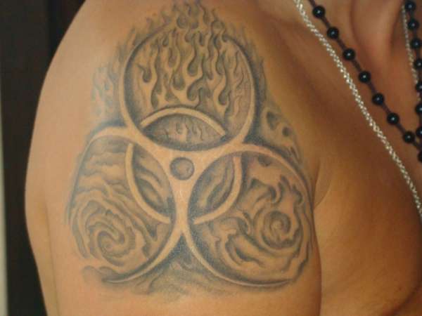 biohazard with water, wind & fire tattoo