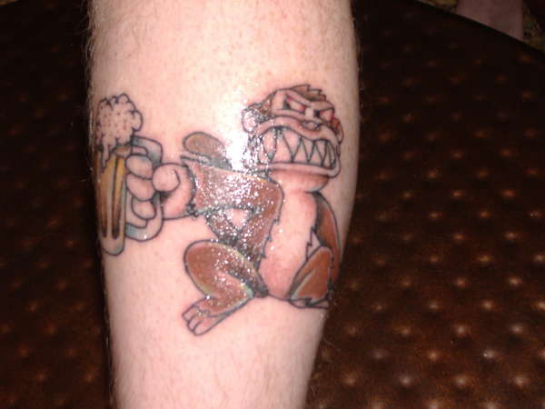 Evil Monkey with a beer tattoo