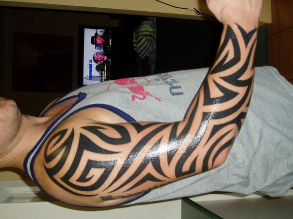 spanks tribal tattoo