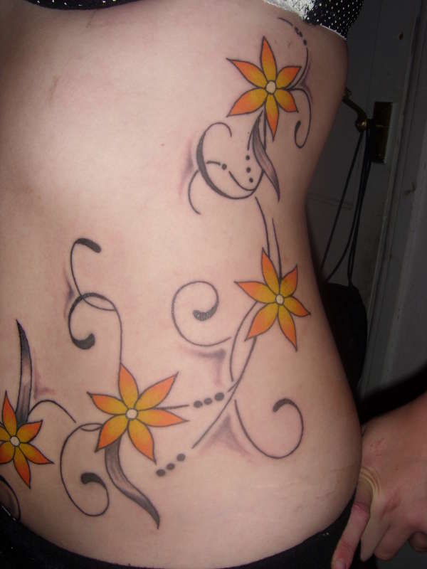 flower pattern on my side tattoo