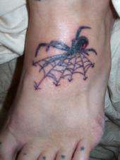 BLACK WIDOW ON LEFT FOOT tattoo