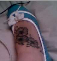crap quality - flowers on my foot tattoo