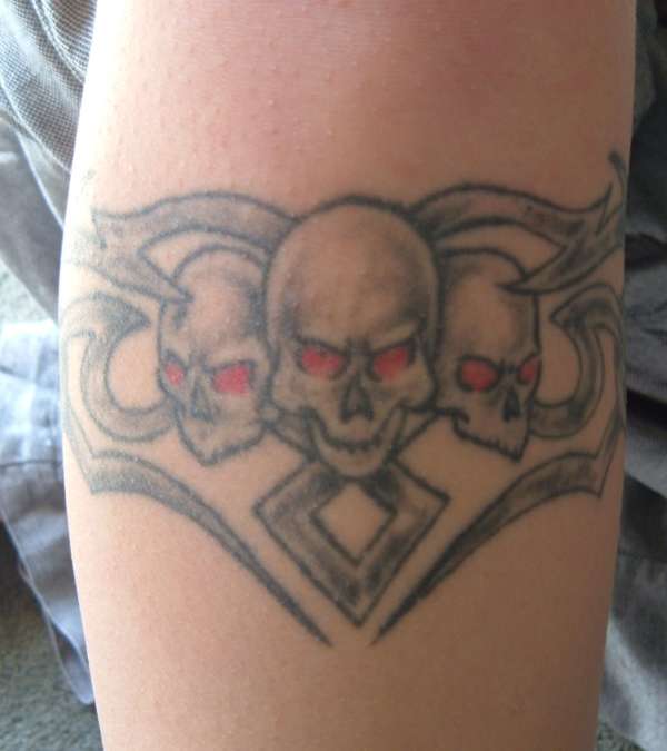 3 Skulls tattoo