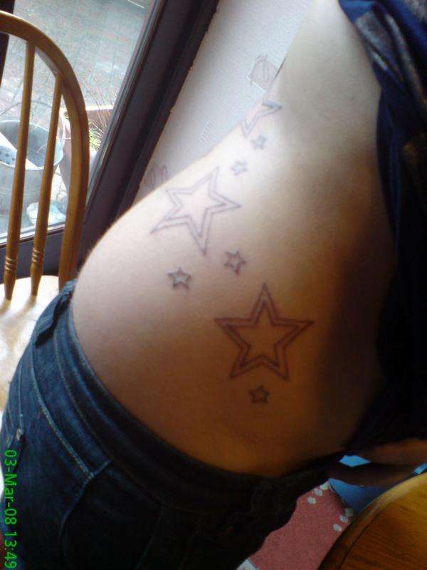 kezs back stars(outline) tattoo