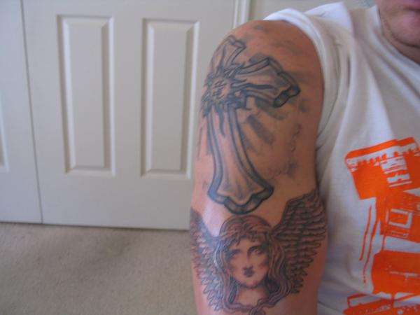 versace angel tattoo