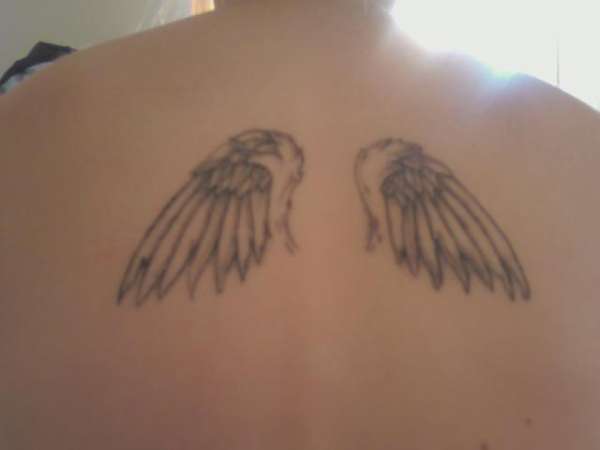 Bailey's wings tattoo