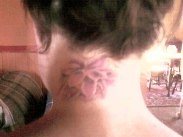 Lotus/Neck tattoo