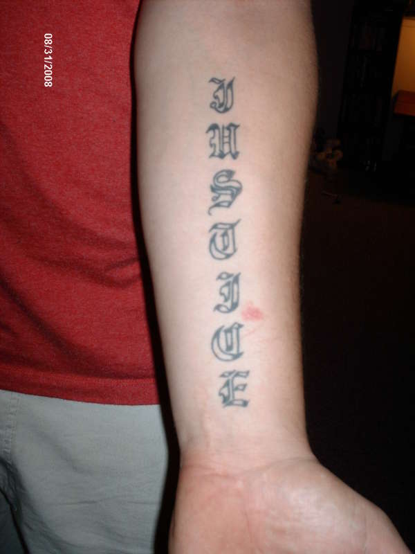 My sons name tattoo
