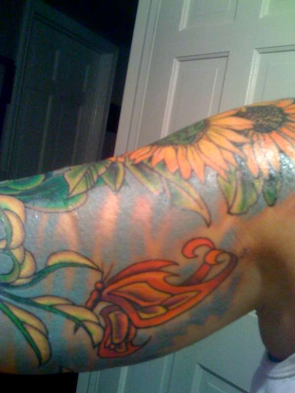 celtic sunflowers tat completed tattoo