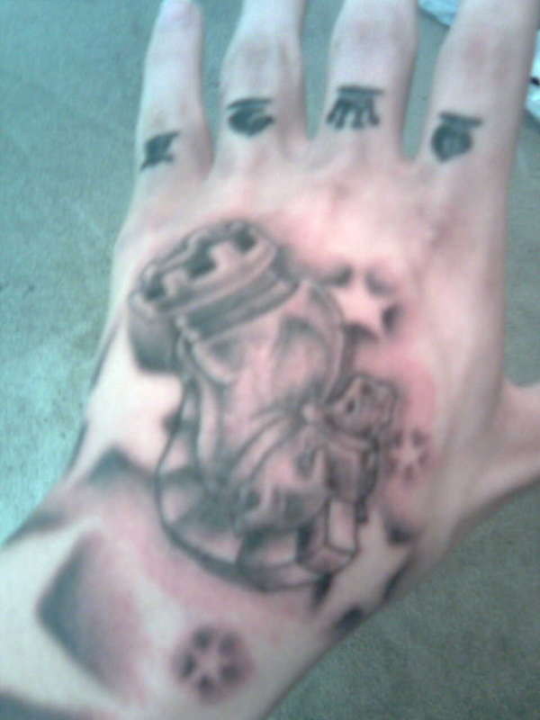 knight on back of hand tattoo