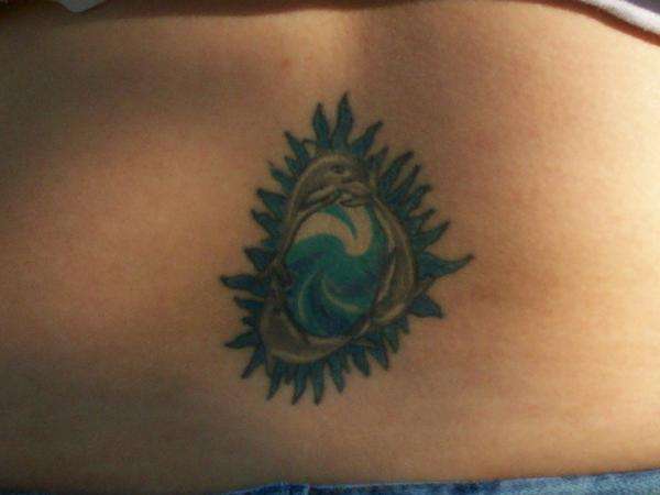 tattoo pictures of ocean waves with dolphin