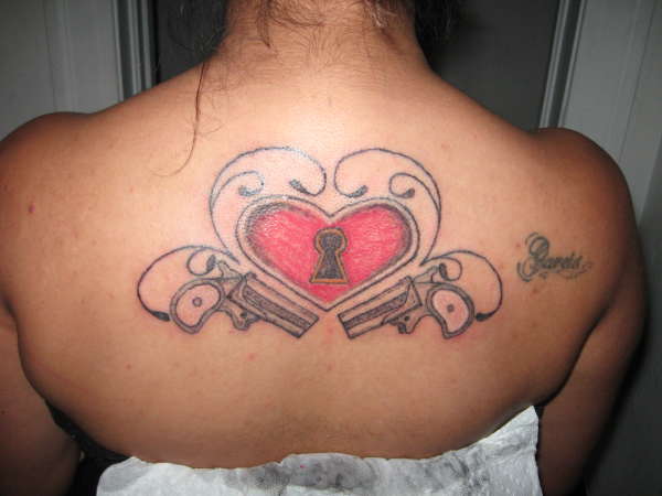 Heart w/Guns tattoo
