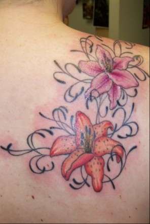 Destiny's flower tattoo