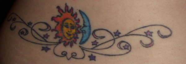 Sun Moon - lower back tattoo