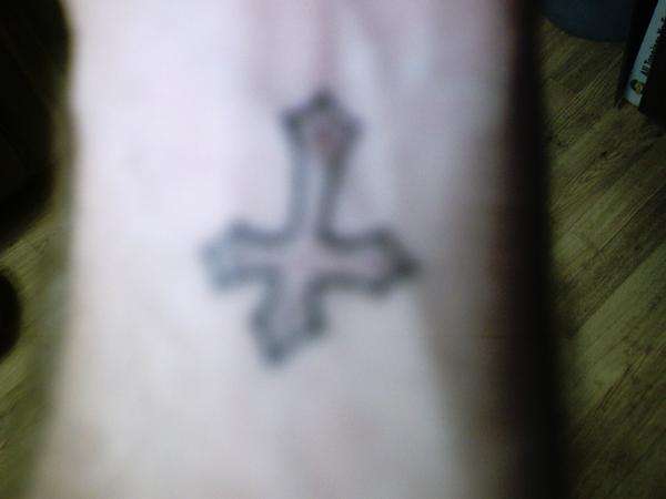 the cross tattoo