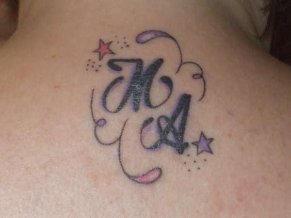 my initials and my husbands too tattoo