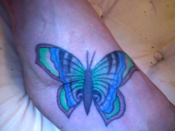 Butterfly cover up tattoo