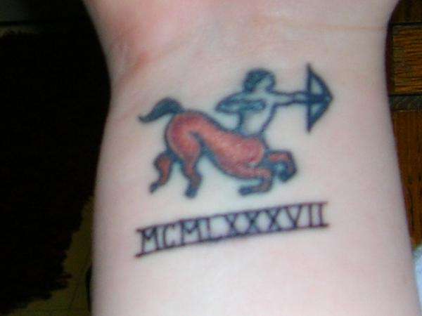 Birth Year in Roman Numerals tattoo