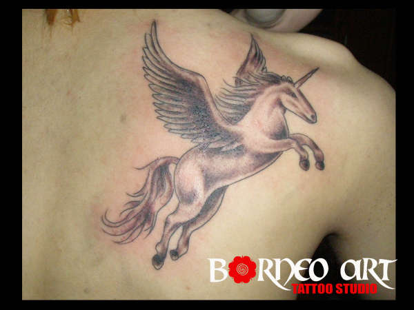 Unicorn tattoo by Reynold tattoo