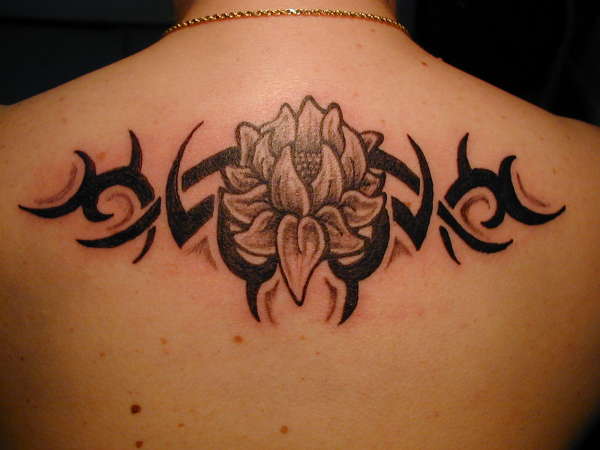 Lotus with Tribal tattoo