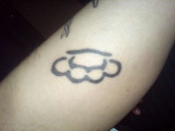 old school brass knuckles tattoo