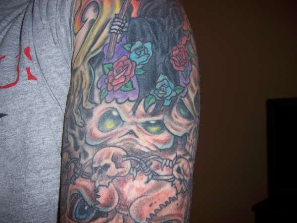reaper/skulls tattoo