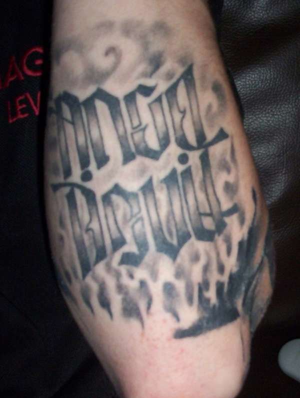 Angel/Devil Ambigram tattoo
