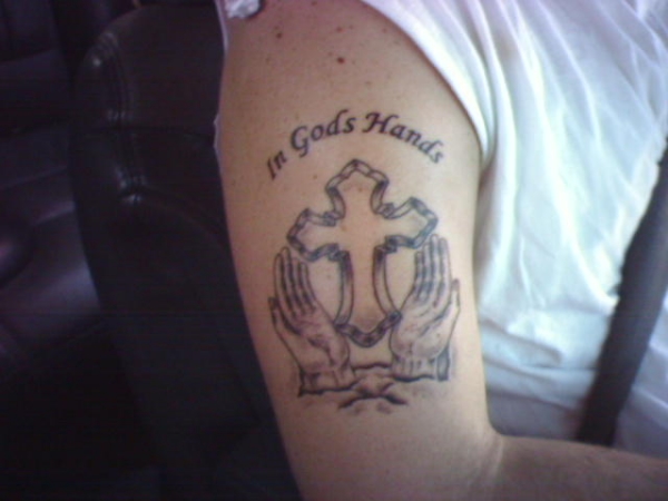 In Gods Hands tattoo