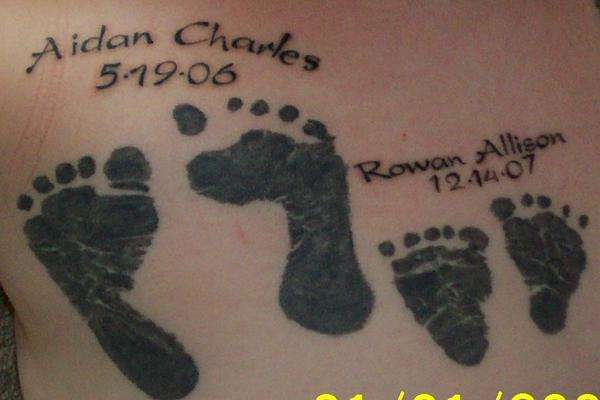 Footprints for my kids tattoo