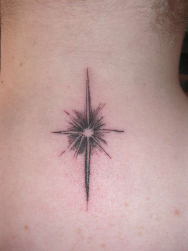 Sparkle on neck tattoo