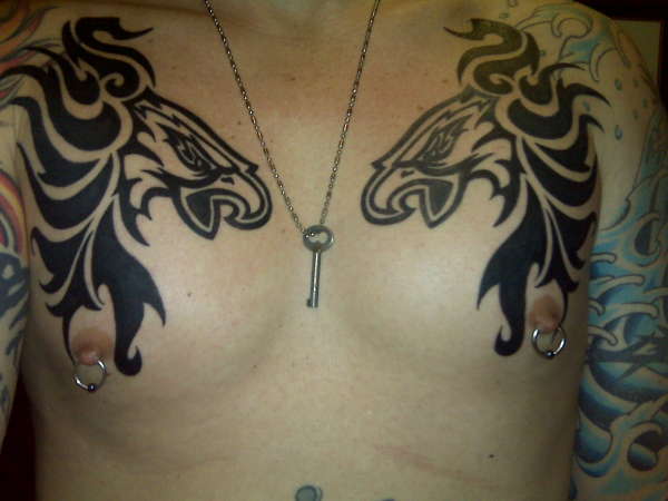 Tribal on chest tattoo