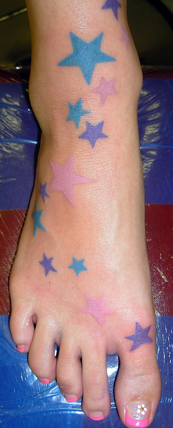 stars on foot tattoo