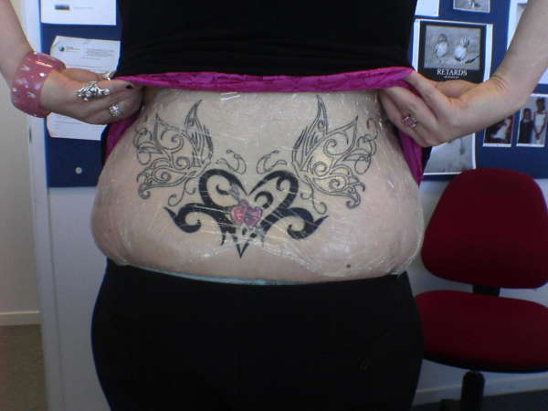 my lower back tat tattoo