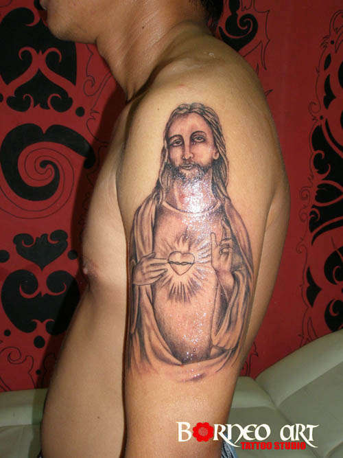Religious tattoo by Reynold tattoo