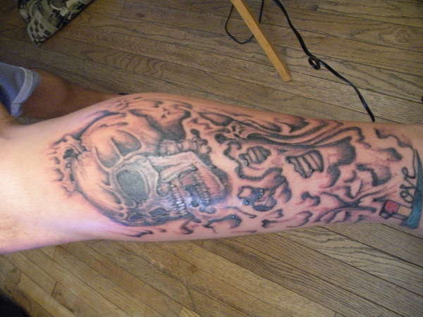 skulls and smoke sock tattoo